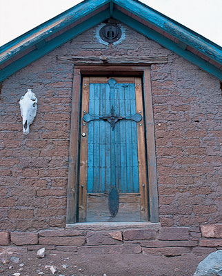 
A heavy door leads to the “pumphouse,” a storage building that supplies power to the bath house.
